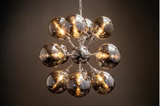 Lampe suspendue design boule en métal coloris blanc argenté Suspens...