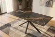 Table Galaxie céramique noire dorée 180 cm piètement étoilé