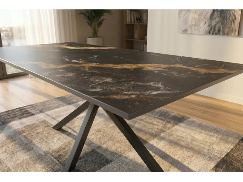 Table Galaxie céramique noire dorée 180 cm piètement étoilé