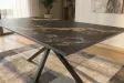 Table Galaxie céramique noire dorée 180 cm piètement étoilé