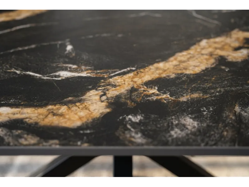 Table Galaxie céramique noire dorée 180 cm piètement étoilé