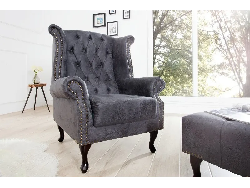 Fauteuil design Chesterfield coloris gris capitonné