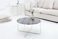 Table basse design en marbre coloris gris avec piétement en métal argenté