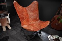 Chaise design en cuir coloris marron clair