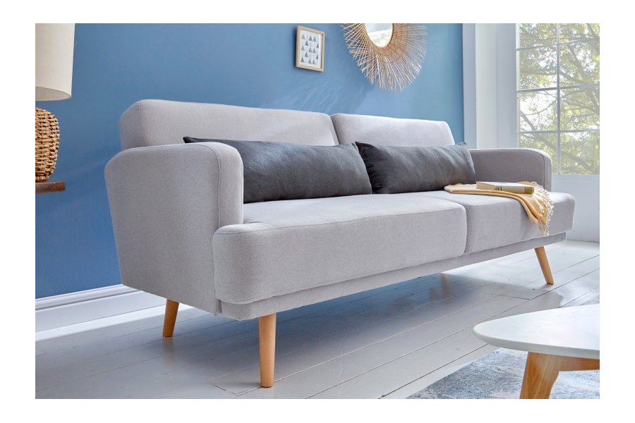 Canapé convertible design scandinave coloris gris claire en tissu avec des pieds en bois massif