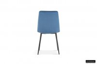 Chaise design en velours coloris bleu, pieds noirs
