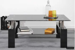 Table basse design coloris noir avec plateau en verre
