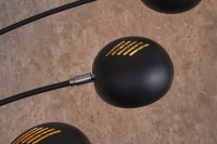 Lampadaire sur pied design arc 5 boules en métal teinté noir et doré